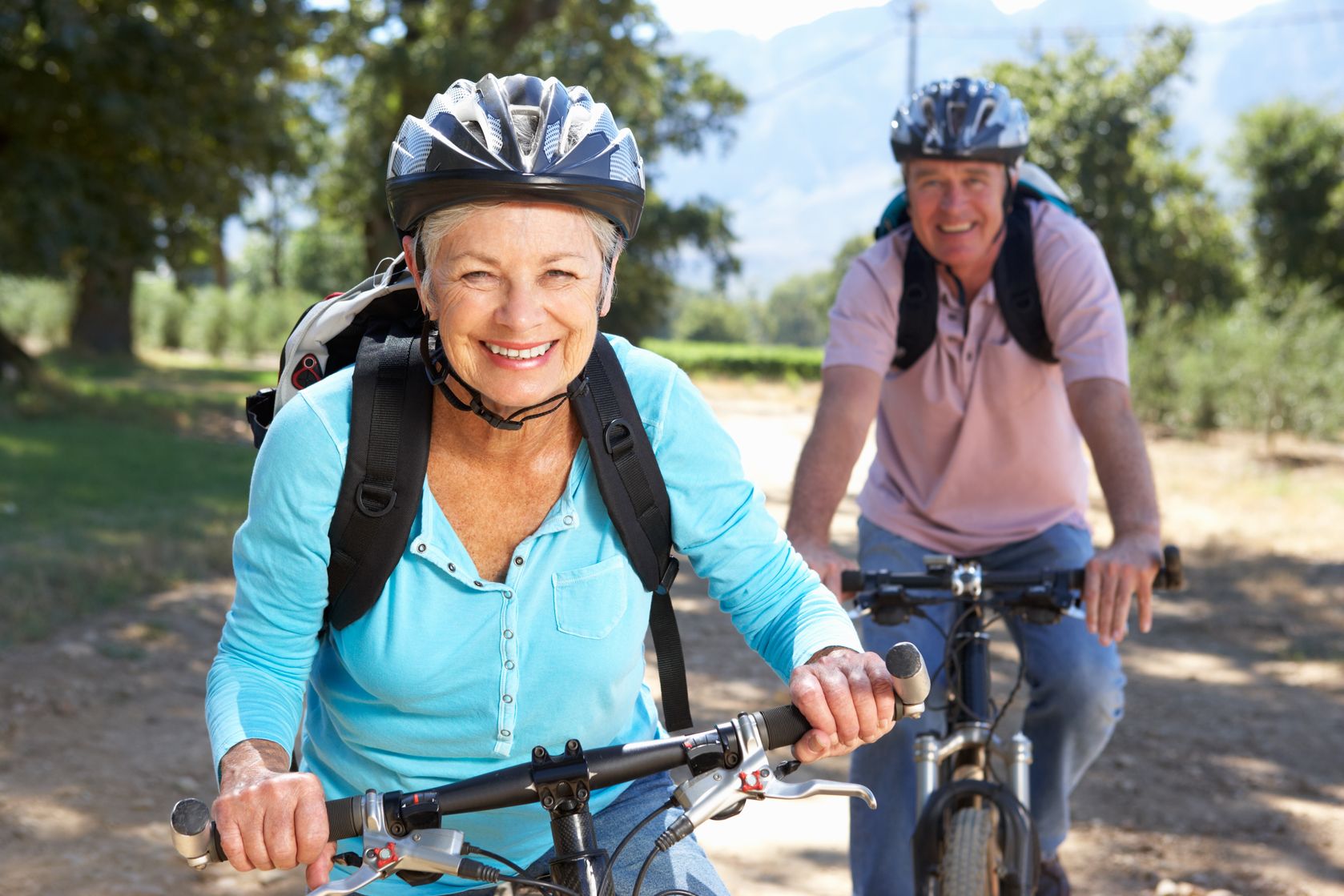 11238366 - senior couple on country bike ride